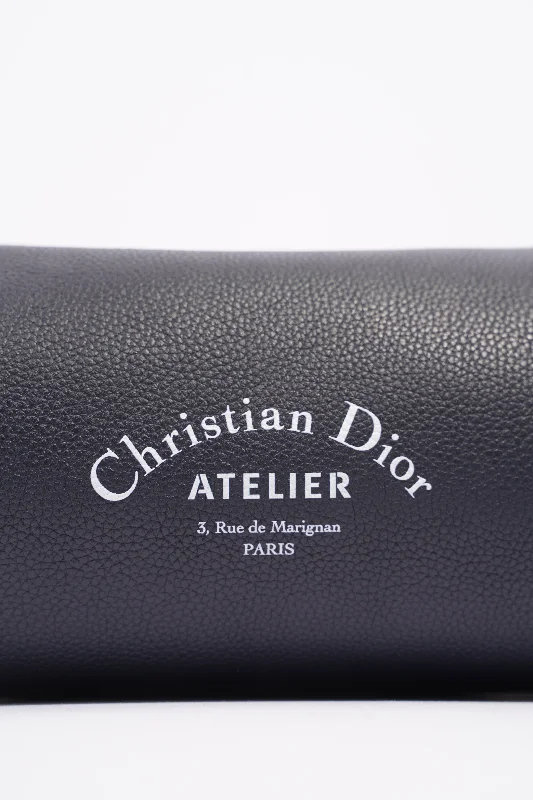 Christian Dior handbags with a snap - button closure and a decorative buckleChristian Dior Mens Roller Messenger Bag Navy