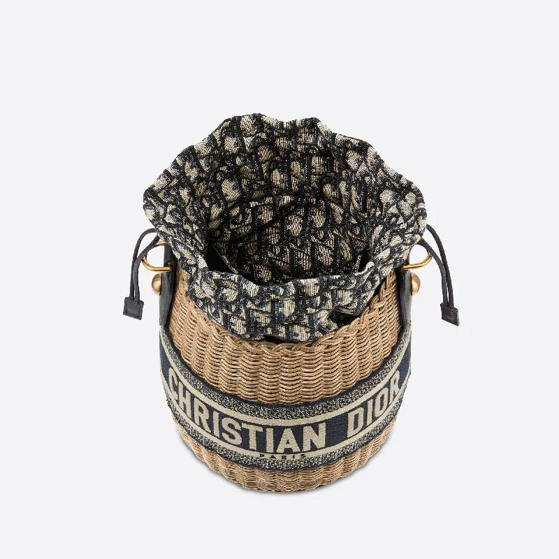 Christian Dior Saddle bags with a studded trim for a bold lookDior WICKER BUCKET Bag